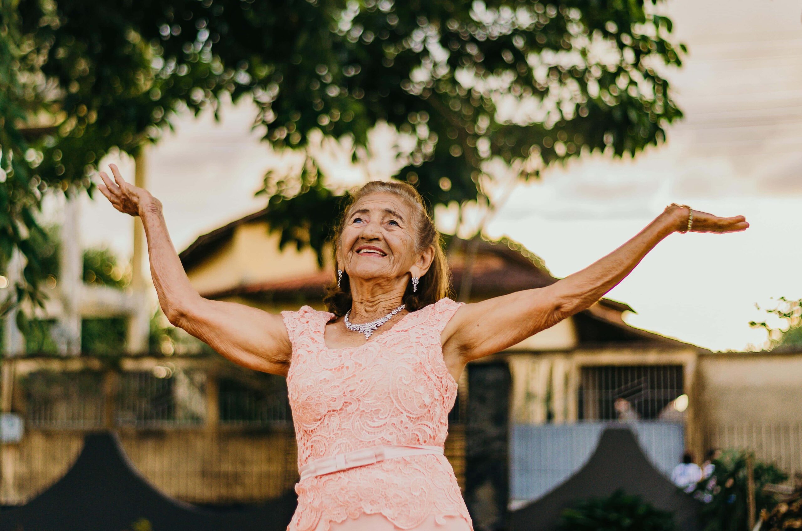 woman-raising-her-both-hands-1786244 2